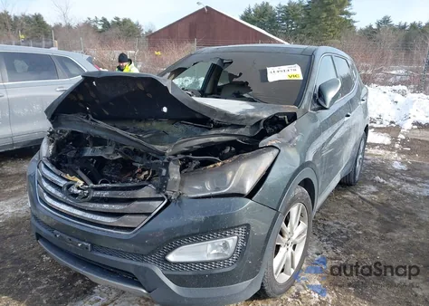 2013 Hyundai Santa Fe Sport 2.0T z USA, uszkodzony, nr VIN 5XYZWDLA4DG019829